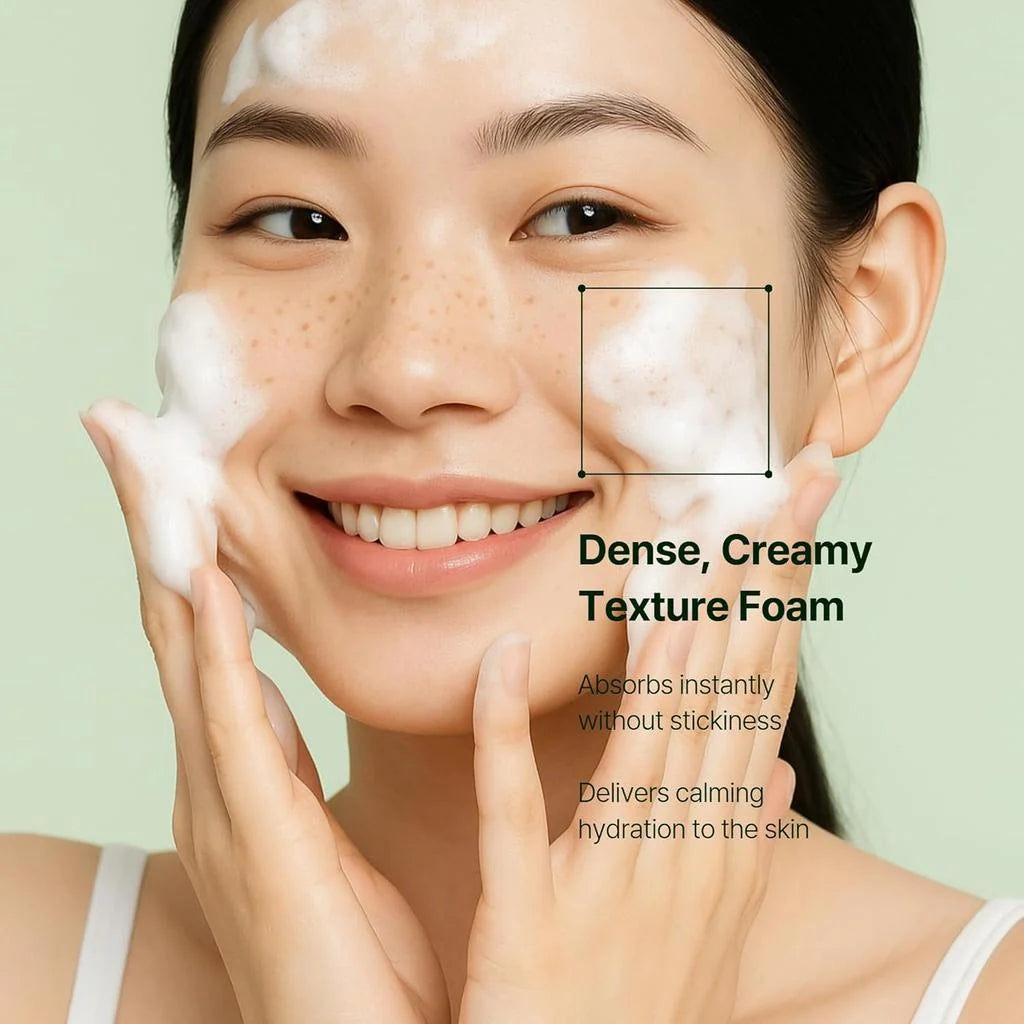 Woman with dense creamy cleansing foam covering cheeks and smile