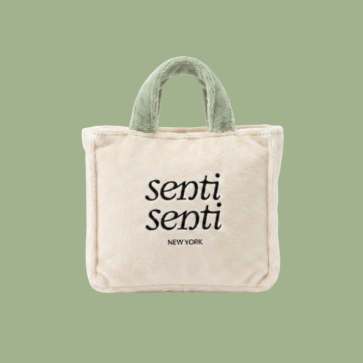 Mini cream tote bag with curved sage green handles and “senti” logo