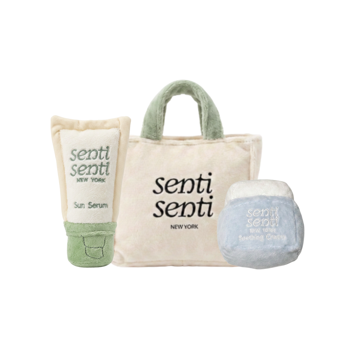 Plush dog toy set: beige tote bag with green carry handles, blue cream ball, green tube