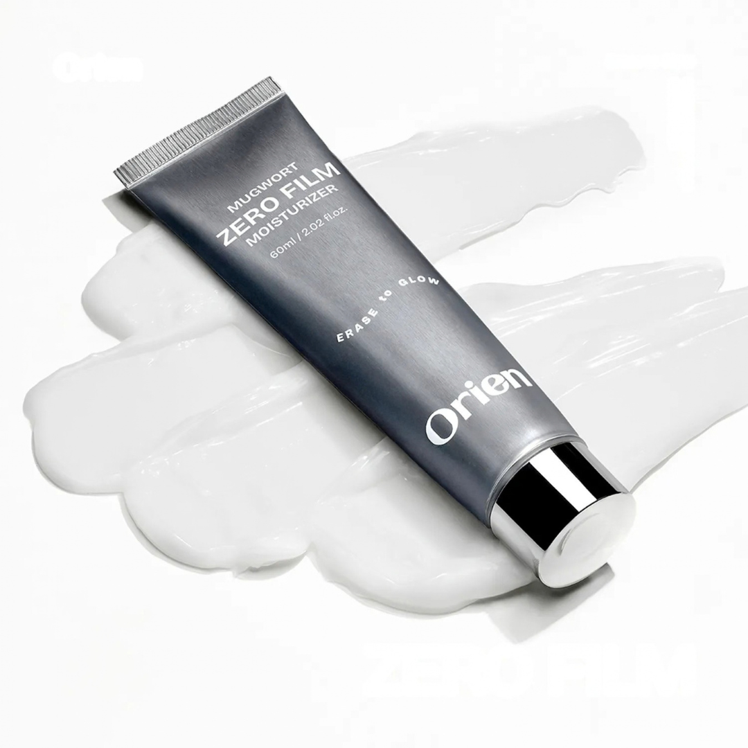 Zero film moisturizer tube with white cream swirls, Orien Mugwort formula, silver cap