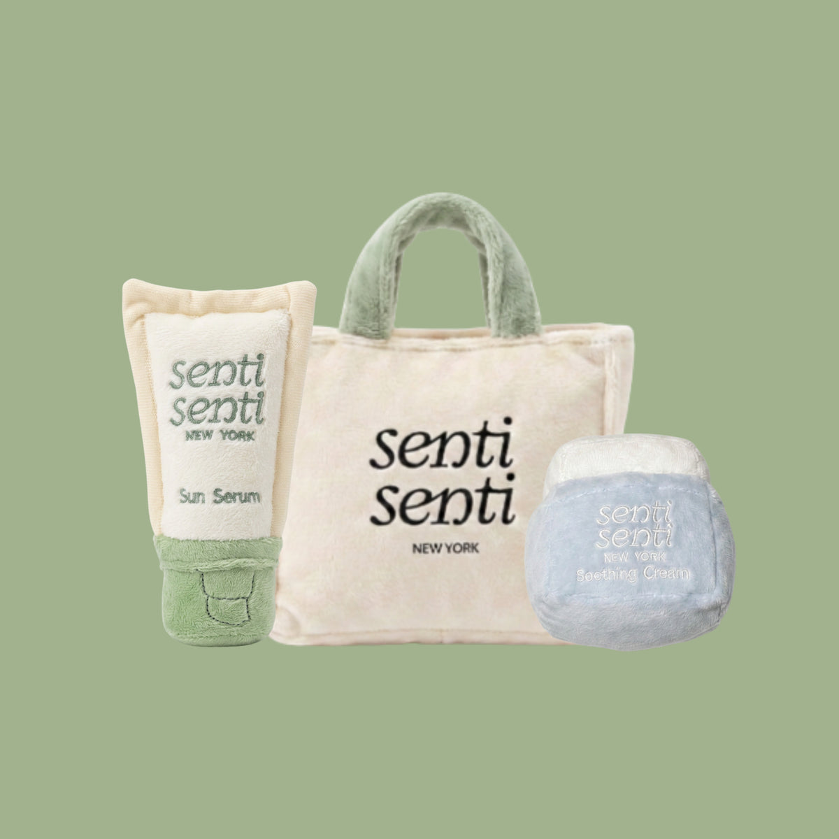 Plush dog toy set with beige tote, green bottle, and light blue cream ball