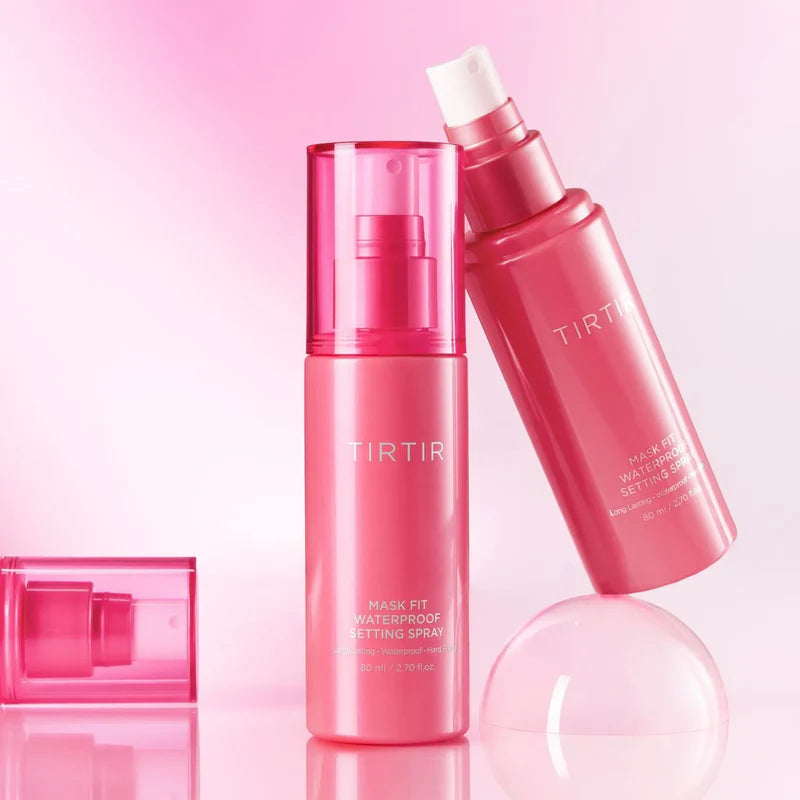 a pink bottle with a white cap